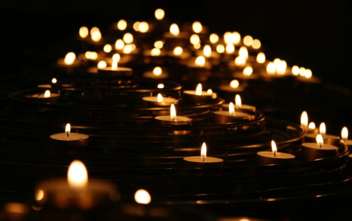 Candles burning in the dark